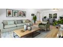 Comfortable living room features neutral tones, plush seating, and stylish decor at 3825 E Camelback Rd # 239, Phoenix, AZ 85018