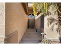 Front entry with a walkway and light fixtures at 9628 E Olla Ave, Mesa, AZ 85212