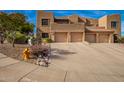 Beautiful stucco home with attached two-car garage at 13840 N Mirage Heights W Ct # 217, Fountain Hills, AZ 85268