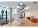 Elegant entry with a modern spiral staircase at 140 E Rio Salado Pkwy # 1205, Tempe, AZ 85281