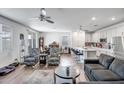 Open concept kitchen with island and stainless steel appliances at 16224 W La Ventilla Way, Goodyear, AZ 85338