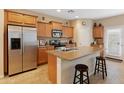 Spacious kitchen with stainless steel appliances and an island at 16225 N 22Nd Dr, Phoenix, AZ 85023