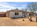 Recently updated home with modern exterior and a well-manicured front yard at 1743 W Verde Ln, Phoenix, AZ 85015