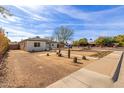 Newly renovated home with a spacious front yard and drought-tolerant landscaping at 1743 W Verde Ln, Phoenix, AZ 85015