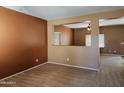 Living room with neutral walls and carpeting at 20356 N 261St Dr, Buckeye, AZ 85396