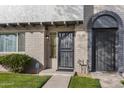 Townhome with 2-story elevation, private entry, and landscaping at 2968 E Clarendon Ave, Phoenix, AZ 85016