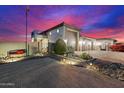 Two-story home with a gated entry and desert landscaping at 34709 N 48Th St, Cave Creek, AZ 85331