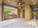 Covered patio with a built-in grill and access to the backyard at 3982 E Sandpiper Dr, Phoenix, AZ 85050