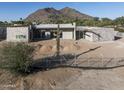 Aerial view of a new construction home with mountain backdrop at 5120 N Casa Blanca Dr, Paradise Valley, AZ 85253