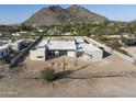 Aerial view of a luxury home under construction, mountain view at 5120 N Casa Blanca Dr, Paradise Valley, AZ 85253