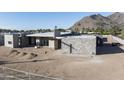 Under construction home showcasing stone exterior and mountain views at 5120 N Casa Blanca Dr, Paradise Valley, AZ 85253