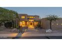 Modern Southwestern style home with a welcoming entryway and walkway at 9823 E Dead Sure Pl, Gold Canyon, AZ 85118