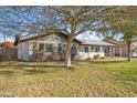 Lovely single-story home with well-kept landscaping and mature shade tree at 1632 E Maryland Ave, Phoenix, AZ 85016