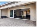 Covered patio with sliding glass doors opening to the living area at 22174 E Creekside Dr, Queen Creek, AZ 85142