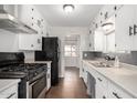 Bright kitchen with white cabinets and modern appliances at 1061 W 5Th St, Mesa, AZ 85201