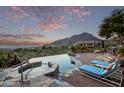 Luxury pool and spa with mountain views at 11510 E Mirasol Cir, Scottsdale, AZ 85255