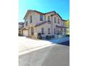 Two-story house with attached garage and landscaping at 16425 W Latham St, Goodyear, AZ 85338