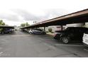 Covered parking area with permit-only spaces at 2606 W Berridge Ln # C208, Phoenix, AZ 85017