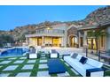 Luxury backyard oasis with a sparkling pool and patio furniture at 26905 N 98Th Way, Scottsdale, AZ 85262