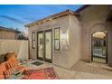 Inviting patio with seating area, adjacent to casita and pool at 29432 N 128Th Ln, Peoria, AZ 85383