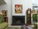 Modern fireplace with black brick and white herringbone wall at 4432 E Camelback Rd # 120, Phoenix, AZ 85018