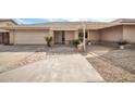 House exterior with a pergola covered entryway at 7337 W Claremont St, Glendale, AZ 85303