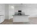 Modern kitchen with stainless steel appliances and granite countertops at 1543 E Lardner Dr, Casa Grande, AZ 85122