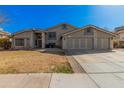 Charming single-Gathering home features a well-manicured lawn, three-car garage, and a welcoming facade at 2715 W Calle Del Norte Dr, Chandler, AZ 85224
