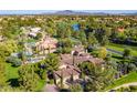 Luxury home with pool and spa, offering scenic lake views at 29 E Oakwood Hills Dr, Chandler, AZ 85248