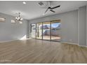 Bright and airy living room with sliding glass doors leading to backyard at 4275 E Bernice E St, Gilbert, AZ 85295