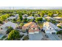 Two-story house with pool and backyard, located in a residential neighborhood at 2042 E Victor Rd Rd, Gilbert, AZ 85296