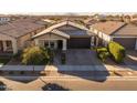 Single-story home with a brick driveway and front yard at 3841 E Patrick St, Gilbert, AZ 85295