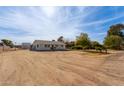 Aerial view of a charming home on a large lot at 521 E Lehi Rd, Mesa, AZ 85203