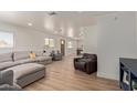 Spacious living room with hardwood floors and comfortable seating at 521 E Lehi Rd, Mesa, AZ 85203