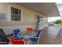 Covered patio with table and chairs, ideal for outdoor dining at 8700 E University Dr # 1315, Mesa, AZ 85207