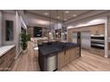 Modern kitchen with island and high-end appliances at 15728 N Mountain Pkwy, Fountain Hills, AZ 85268