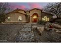 Stunning two-story home with a charming facade and stone pathway at 36039 N 58Th St, Cave Creek, AZ 85331