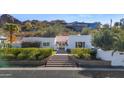 Stunning Spanish-style home with manicured landscaping and mountain views at 4601 E Solano Dr, Phoenix, AZ 85018