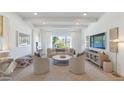 Bright and airy living room with modern furniture and a view at 4601 E Solano Dr, Phoenix, AZ 85018