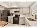Modern kitchen with stainless steel appliances and island at 6031 E Evans Dr, Scottsdale, AZ 85254