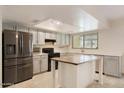 Updated kitchen, stainless steel appliances, island at 6031 E Evans Dr, Scottsdale, AZ 85254