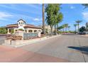Building entrance with landscaping and parking at 7291 N Scottsdale Rd # 2009, Paradise Valley, AZ 85253