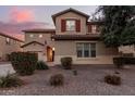 Two-story house with attached garage and landscaping at 739 E Lovebird Ln, Gilbert, AZ 85297
