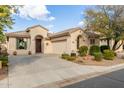 Well-maintained house with attractive curb appeal and a welcoming front porch at 21056 E Avenida Del Valle --, Queen Creek, AZ 85142