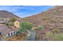 Luxury home nestled on a hillside with a mountain view and private driveway at 6216 W Molly Dr, Phoenix, AZ 85083