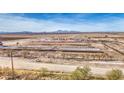 Aerial view of a ranch with covered animal shelters at 8050 S Bianco Rd, Casa Grande, AZ 85193