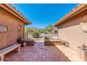 Charming courtyard entry with tile flooring and mountain views at 8637 E Golden Cholla Cir, Gold Canyon, AZ 85118