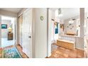 Bright hallway with tile flooring and access to multiple rooms at 8637 E Golden Cholla Cir, Gold Canyon, AZ 85118