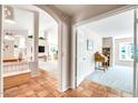 Open floor plan with tile flooring and views into other rooms at 8637 E Golden Cholla Cir, Gold Canyon, AZ 85118