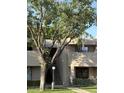 Inviting two-story condo with charming exterior details and a well-maintained front yard at 1920 W Lindner W Ave # 108, Mesa, AZ 85202